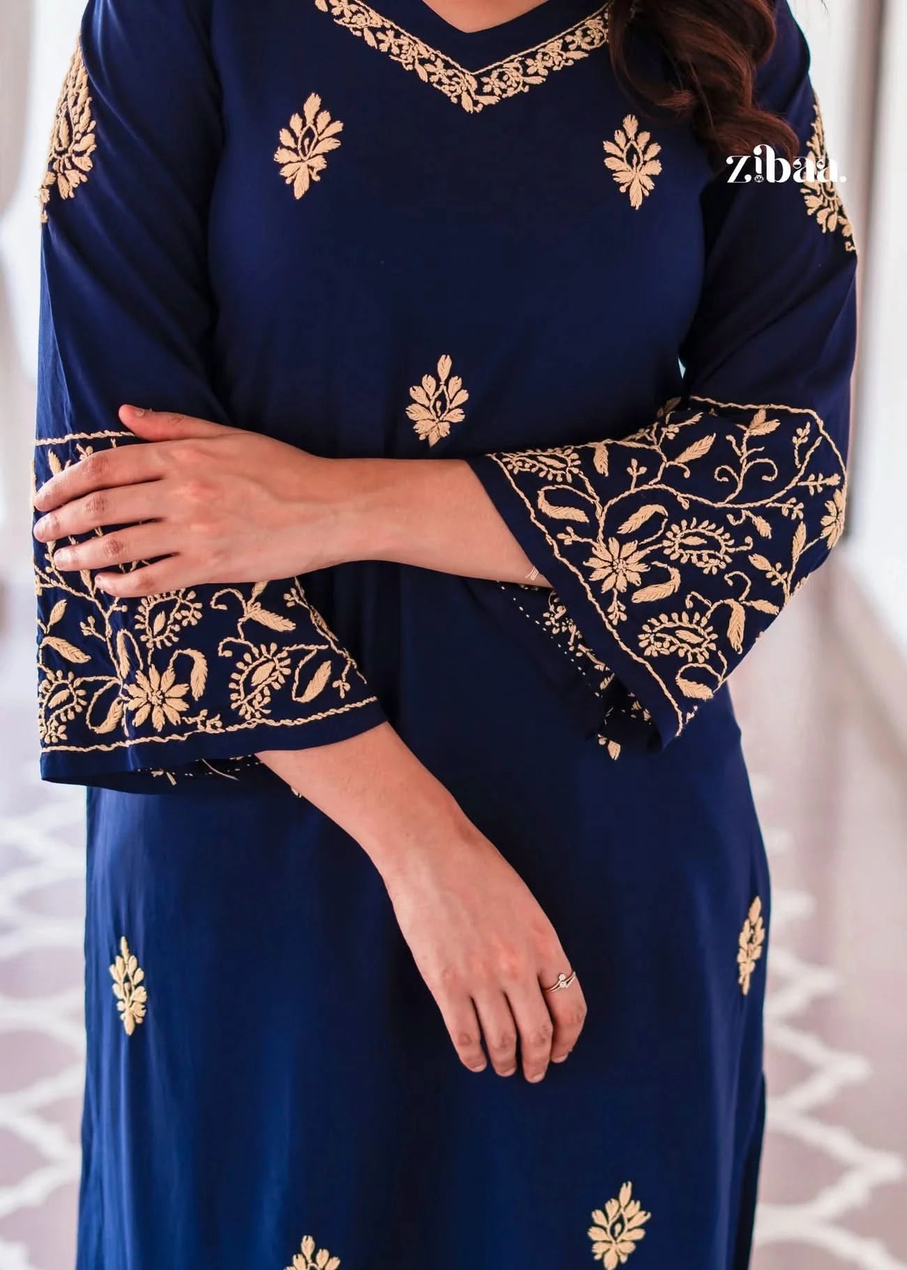 The blue kurta stands out with golden embroidery on its bell sleeves.
Designed as festive wear for stylish yet traditional outfits. A beautiful ethnic wear addition to any wardrobe.