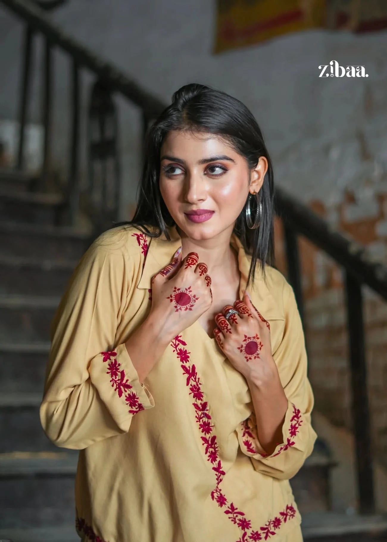 Featuring red floral embroidery, this beige co-ord set is comfortable and classy. A perfect choice for modern ethnic style statements.