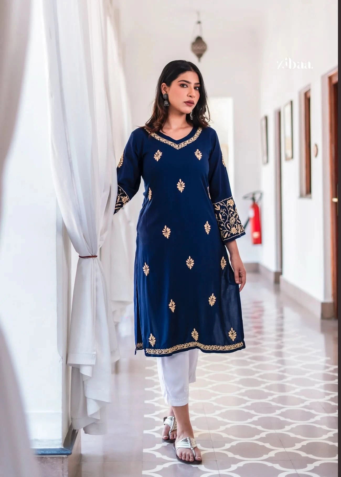 This navy blue kurta features golden embroidery motifs throughout.
Designed as a flowy ethnic wear piece for comfort and elegance. Perfect traditional outfit for festive wear and semi-formal events.