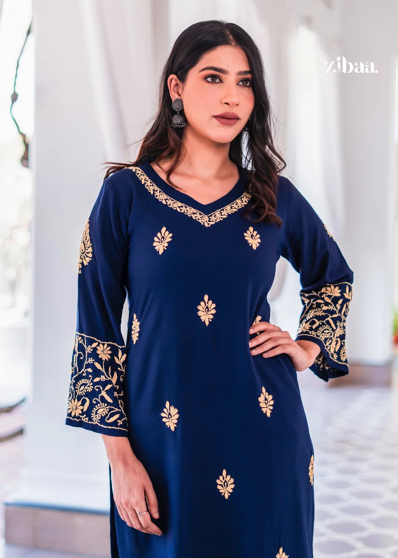 This elegant blue kurta is styled with golden embroidery on the neckline.
The embroidered bell sleeves enhance the festive and ethnic wear look.
Perfect traditional outfit for weddings, parties, and cultural gatherings.