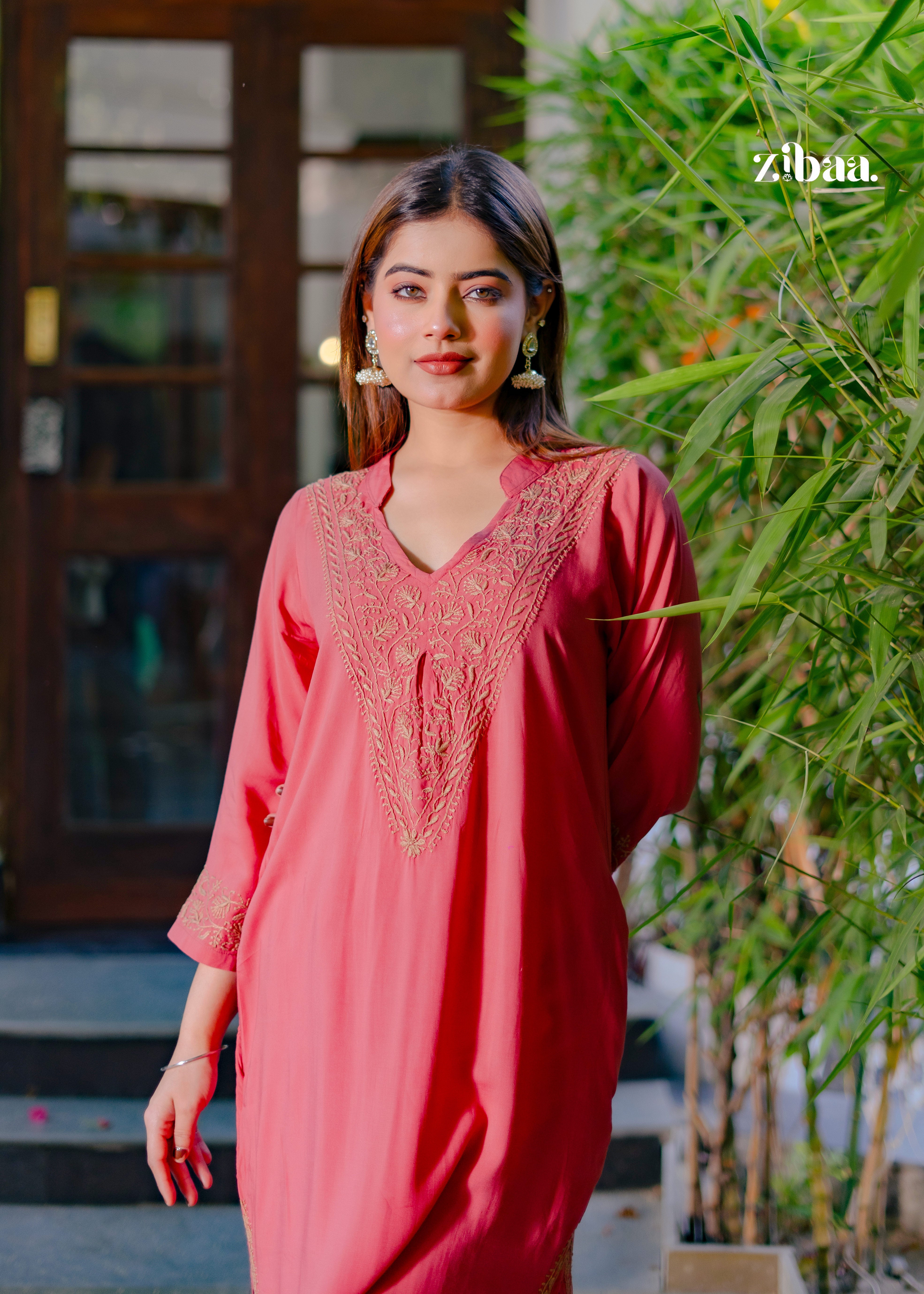 Graceful coral kurta with intricate golden embroidery on neckline.
Lightweight fabric designed for comfort and elegance.
Perfect for festive, semi-formal, and casual occasions.